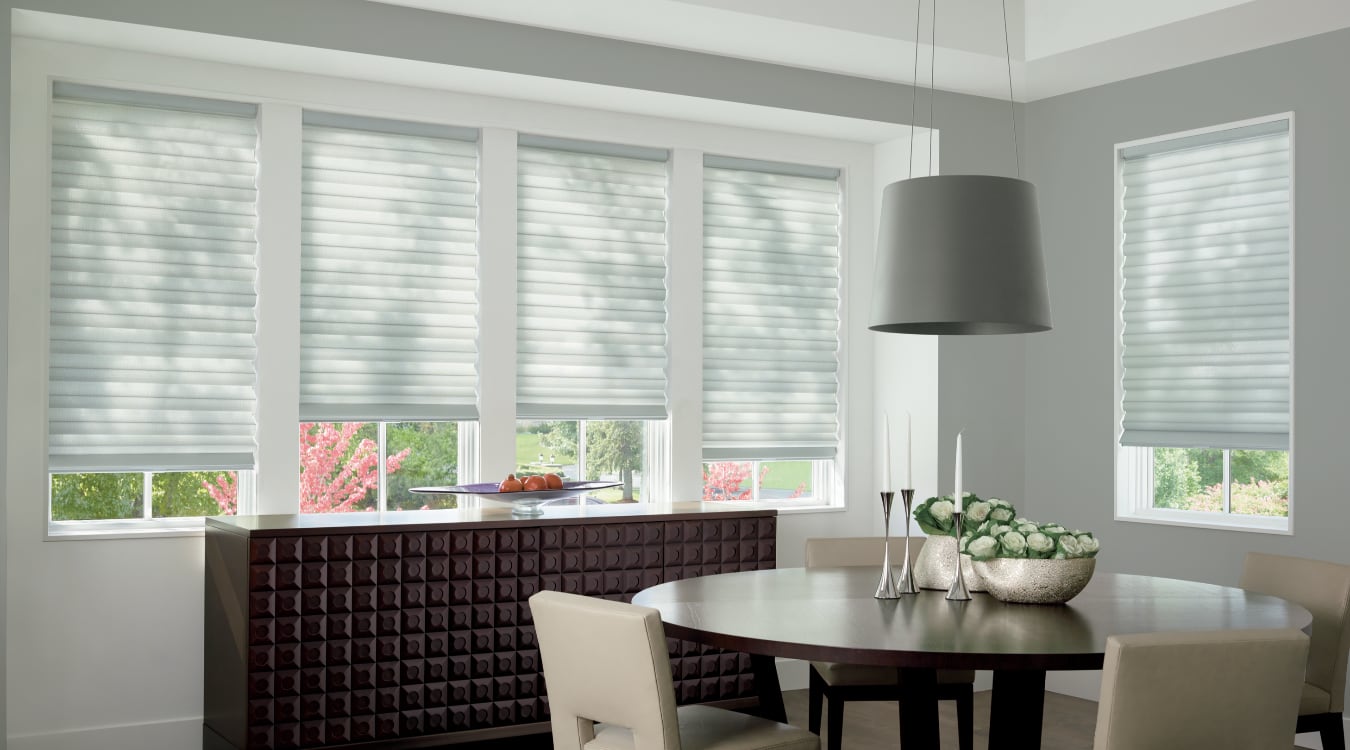 Cordless motorized shades in a Gainesville dining room